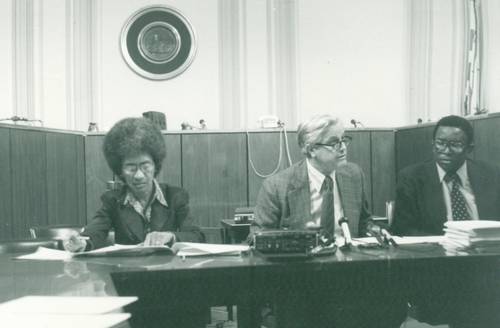 The D.C. Bank Campaign was launched on June 15, 1979 to oppose bank loans to South Africa. Washington, D.C. Councilmember Hilda Mason of the D.C. Statehood Party introduced a bill to prohibit the city from dealing with banks making loans to South Africa. Seen here addressing a meeting on bank loans is Councilmember Mason; Edgar Lockwood, Executive Director of the Washington Office on Africa; and Dumisani Kumalo, national coordinator of the Committee to Oppose Bank Loans to South Africa.